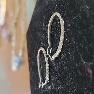 Silver earrings with diamond like affect